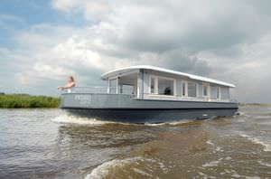 bateau maison in-bord / fluvial