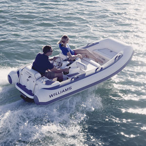 bateau pneumatique in-bord / hydrojet / semi-rigide / à console centrale