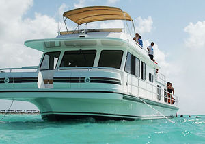 bateau maison in-bord / fluvial