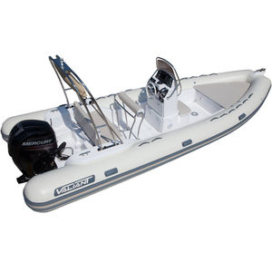 bateau pneumatique hors-bord / semi-rigide / à console centrale / bain de soleil