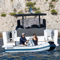Bateau pneumatique électrique / hors-bord...