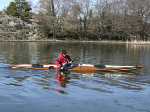 kayak rigide / de mer / monoplace / en carbone