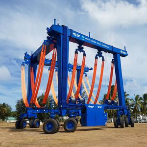travel lift toutes roues directrices