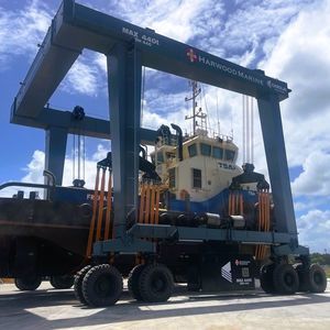 travel lift toutes roues directrices