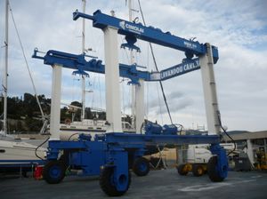 travel lift toutes roues directrices