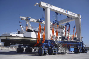 travel lift toutes roues directrices