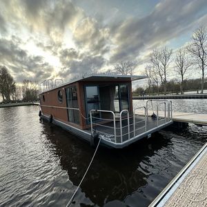 bateau maison hors-bord