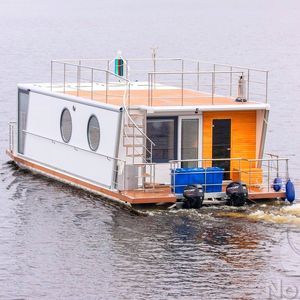 bateau maison hors-bord