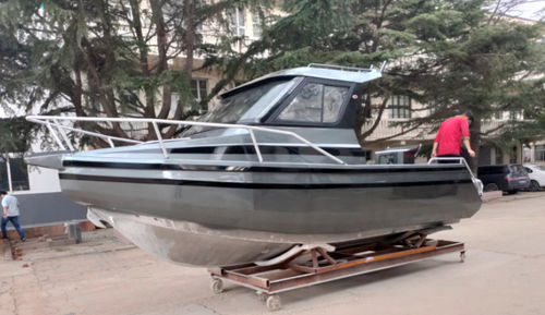 Bateau de pêche-promenade hors-bord - LEADER 588 - Qingdao Allheart Marine Co., Ltd. - avec timonerie / max. 6 personnes / pont en teck