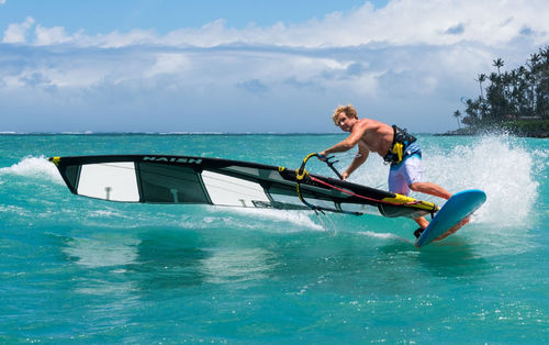 Voile de planche de freeride - SL - Naish Windsurfing - de slalom / de vitesse / 7 lattes