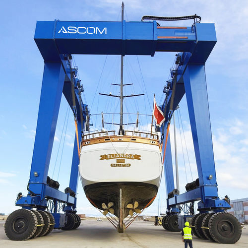 Travel lift contrôlé à distance - BHT 670 - ASCOM - toutes roues directrices / pour charge lourde