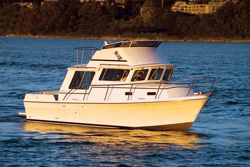 Cabin-cruiser in-bord - VOYAGER 3000 - Sea Sport, Inc - à fly / 4 couchages
