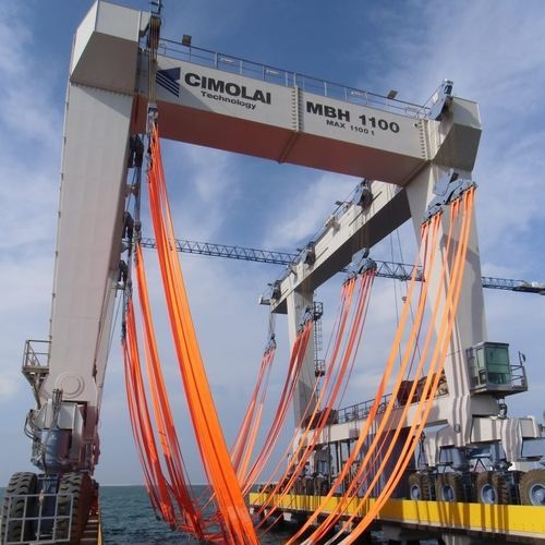 Travel lift contrôlé à distance - MBH 1100 - CIMOLAI TECHNOLOGY SPA - toutes roues directrices / pour charge lourde