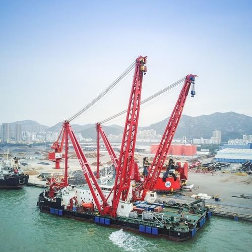 Grue sur quai flottant - Huisman - pour forte charge / à flèche articulée / offshore