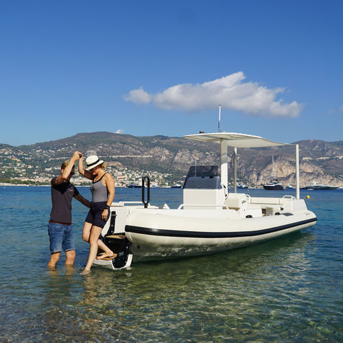 Bateau pneumatique in-bord - BEACHLANDER Series - Xtenders - semi-rigide / à console centrale / de plongée