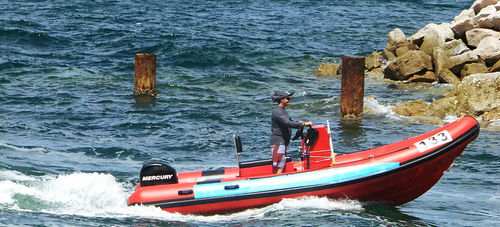 Bateau pneumatique hors-bord - 580 - Fareast Boats - RIB / à console centrale / en fibre de verre