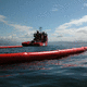 barrage de confinement / flottant / en haute mer